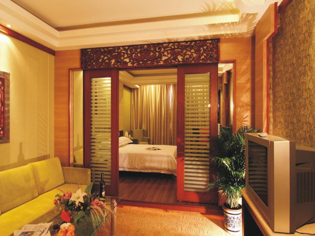 New Beacon Xinhang International Hotel Wuhan Rum bild